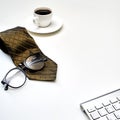 Modern white office desk top table with a cup of coffee Royalty Free Stock Photo