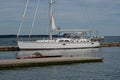 Modern white Sailboat docked on York River