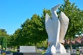 Modern white sculpture of a abstract bird