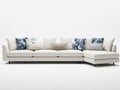 Modern white sectional sofa with decorative pillows Royalty Free Stock Photo