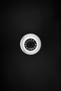 Modern white security camera isolated on black background. Diy of Cctv. Video surveillance concept.