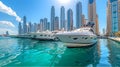 Modern white super yachts are moaning in Dubai marina. Beautiful reflections in blue water and skyscrapers at the background