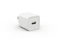 Modern white travel adapter with a usb port for international use Royalty Free Stock Photo