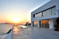 Modern white villa with sea view at sunset Royalty Free Stock Photo