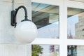 Modern white wall lamp ball shape interior lighting bulbs colonial style architecture building decoration Royalty Free Stock Photo