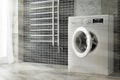 Modern White Washing Machine in Bathroom Interior. 3d Rendering Royalty Free Stock Photo
