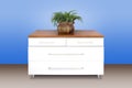 Modern white wooden chest of drawers Royalty Free Stock Photo