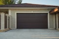 Modern wide gates for two cars in a private house