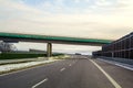 Modern wide smooth empty asphalt highway stretching to horizon u