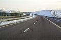 Modern wide smooth empty asphalt highway stretching to horizon u