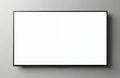 Modern widescreen TV hangs on wall. Blank white screen provides copy space for your media content. Thin black frame on grey Royalty Free Stock Photo