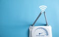 Modern wifi router with a speedometer. Internet speed Royalty Free Stock Photo