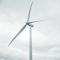 Modern Wind Turbine Against Cloudy Sky Royalty Free Stock Photo