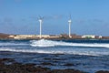 Modern windmills on the beach Royalty Free Stock Photo