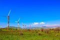 Modern windmills and snowy Hermon Royalty Free Stock Photo