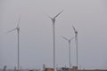 Modern windmills and sunset in thar desert Jaisalmer Rajasthan India Royalty Free Stock Photo