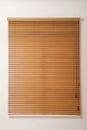Modern window with closed wooden blinds Royalty Free Stock Photo