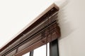 Modern window with stylish wooden blinds Royalty Free Stock Photo