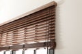 Modern window with stylish wooden blinds