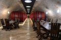 Modern wine cellar in Balatonlelle Hungary with huge wine barrels and wooden tables Royalty Free Stock Photo