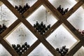 Modern Wine Cellar Display with Wooden Grid and Backlighting Royalty Free Stock Photo