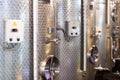 Modern wine production, large steel tanks, fermentation process, winemaking Royalty Free Stock Photo