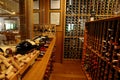 Modern wine storage cellar in a restaurant or house with bottles and corks. Sommelier concept. Royalty Free Stock Photo