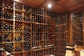 Modern wine storage cellar in a restaurant or house with bottles and corks. Sommelier concept. Royalty Free Stock Photo