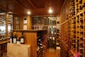Modern wine storage cellar in a restaurant or house with bottles and corks. Sommelier concept. Royalty Free Stock Photo