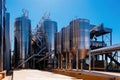 Modern winery outdoors. Stainless steel vats for wine fermentation Royalty Free Stock Photo