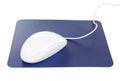 Modern wired optical mouse and blue pad isolated Royalty Free Stock Photo