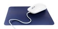Modern wired optical mouse and blue pad isolated Royalty Free Stock Photo