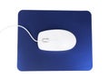 Modern wired optical mouse and blue pad isolated, top view Royalty Free Stock Photo