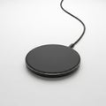 Modern wireless charging pad with usb cable Royalty Free Stock Photo