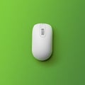 Modern wireless computer mouse on green background, top view Royalty Free Stock Photo