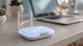 Modern wireless router on light wooden desk in home office Royalty Free Stock Photo