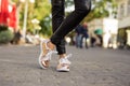 Modern woman in shinny sneakers s