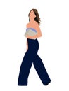 Modern woman walking. Pretty girl side view. Royalty Free Stock Photo