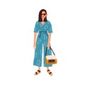 Modern woman wearing fashion outfit. Female in blue jumpsuit and sandals. Fashionable casual look. Model dressed in