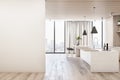 Modern wood and concrete kitchen interior with empty mock up place on wall, island, appliances and window with city view and Royalty Free Stock Photo