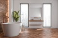 Modern wood look bathroom with two narrow windows Royalty Free Stock Photo