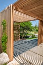 Modern wooden arbor. Modern wooden gazebo in courtyard, backyard Royalty Free Stock Photo