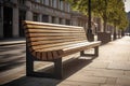 Modern wooden benches standing on the sides of the paved paths of the city park on a rainy day Royalty Free Stock Photo