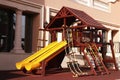 Modern wooden children playground in park with multy activities Royalty Free Stock Photo