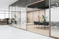 Modern wooden, concrete and glass meeting room interior with furniture and partitions. Workplace concept.