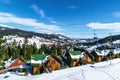 Modern wooden cottage in a tourist winter resort in the mountains