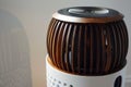 Modern wooden designed bluetooth speaker is standing on floor Royalty Free Stock Photo