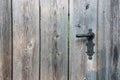 The Modern wooden door with metal door handle over the white wall. -Image Royalty Free Stock Photo