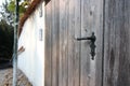 The Modern wooden door with metal door handle over the white wall. -Image Royalty Free Stock Photo