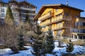 Modern wooden hotels on a bright sunny day in the charming Swiss resort of Saas-Fee Royalty Free Stock Photo